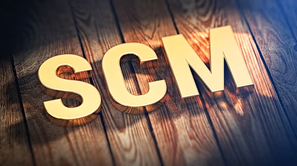 Акроним SCM на деревянных досках — стоковое фото