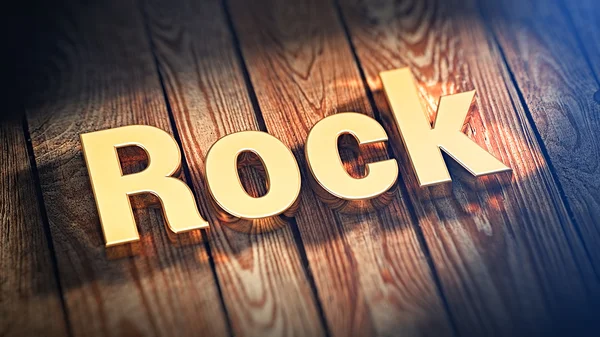 Word Rock on wood planks — Stock Photo, Image