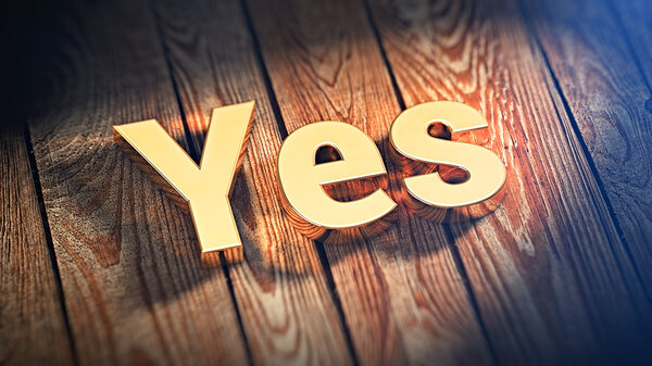 Word Yes on wood planks