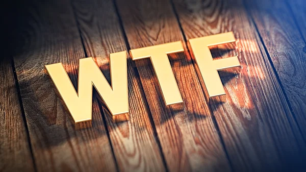 Acrónimo WTF sobre tablones de madera — Foto de Stock