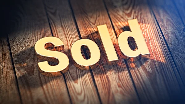 Word Sold on wood planks — Stock Photo, Image