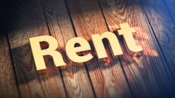 Word Rent on wood planks — Stock Photo, Image