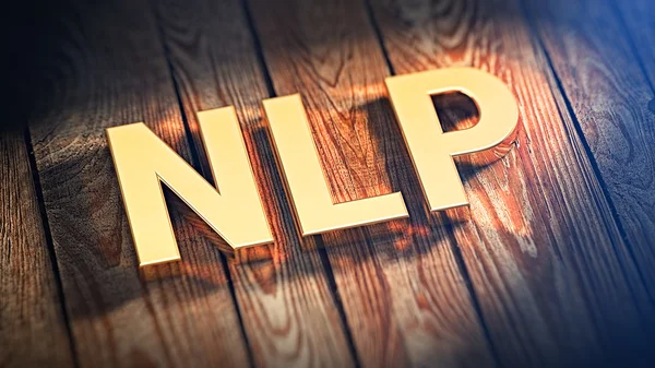 Acrónimo NLP sobre tablones de madera — Foto de Stock