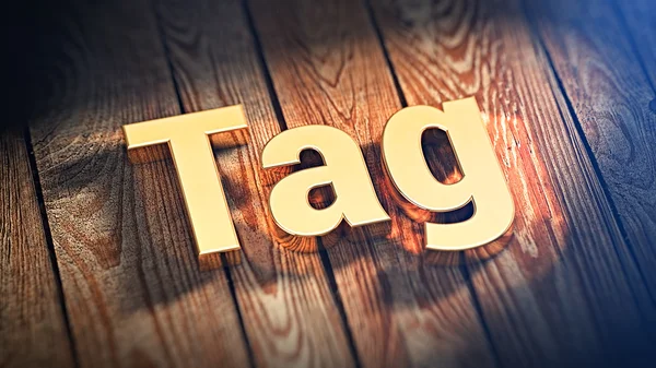 Word Tag op houten planken — Stockfoto