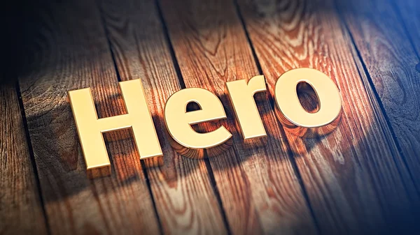 Herói palavra em tábuas de madeira — Fotografia de Stock