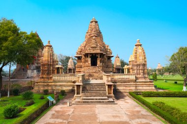 Khajuraho is a group of hindu temples and jain temples at Khajuraho town in Madhya Pradesh state in India clipart
