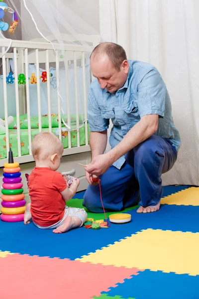 Boy rejoices to cheerful game — Stock Photo, Image