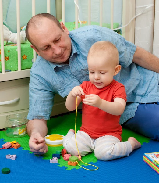 Boy rejoices to cheerful game — Stock Photo, Image