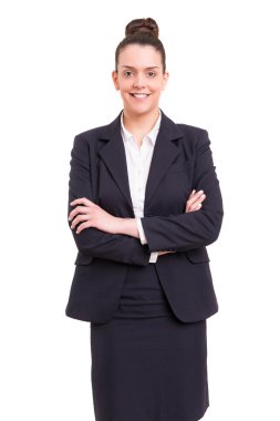 Güzel iş kadını kameraya bakıyor.