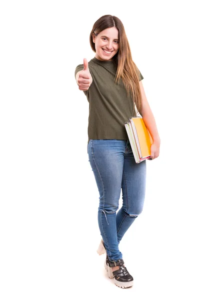 Frau trägt Bücher bei sich — Stockfoto