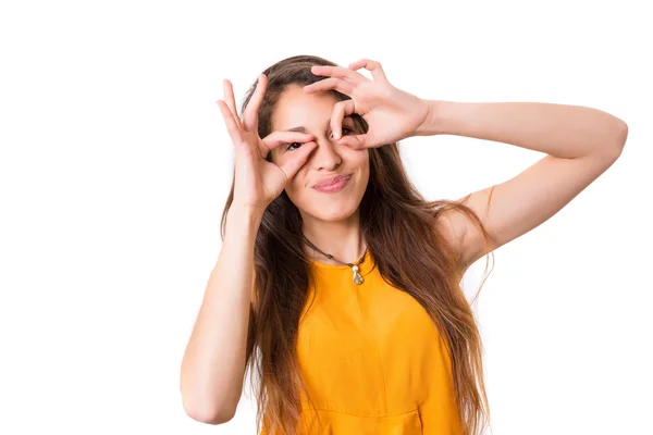 Mujer joven haciendo una expresión tonta —  Fotos de Stock