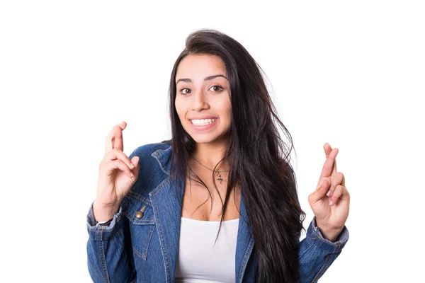 Vrouw met gekruiste vingers — Stockfoto