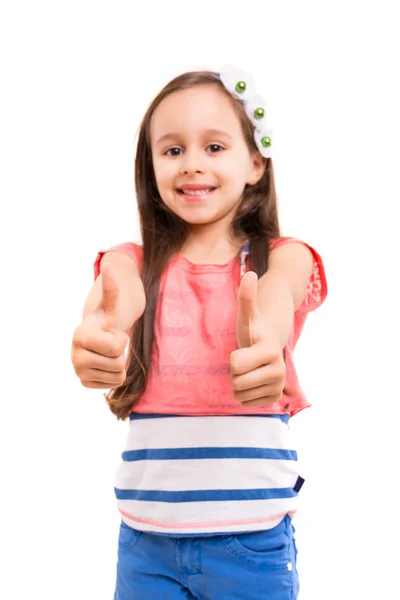 Menina pequena mostrando polegares para cima sinal — Fotografia de Stock