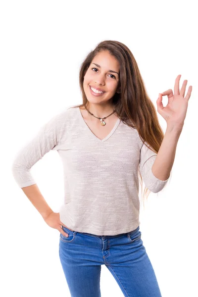 Beautiful young woman gesturing ok sign — Stock Photo, Image