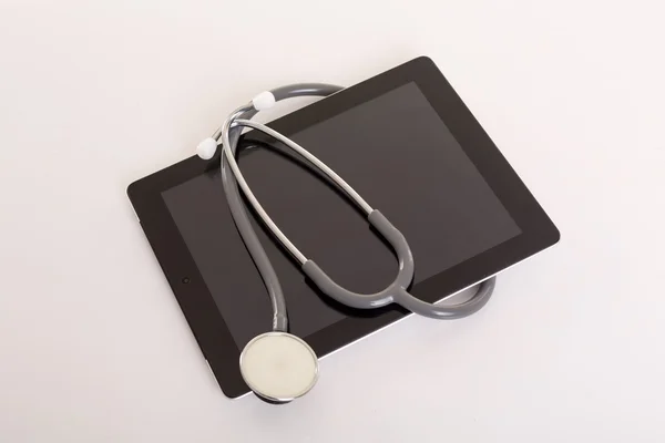 Stethoscope over a tablet computer — Stock Photo, Image