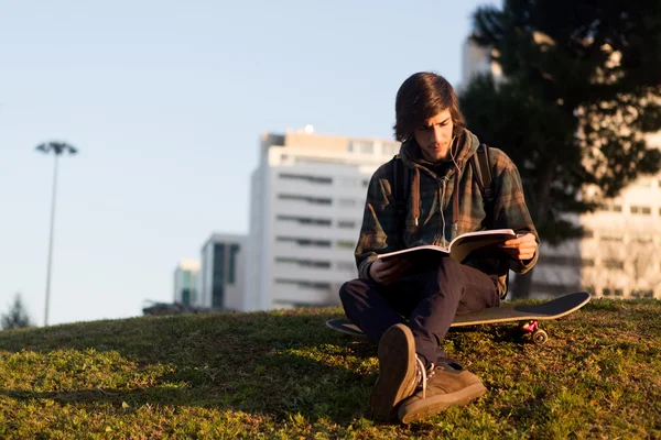 Boy relaxing at the city park — Stock Photo, Image