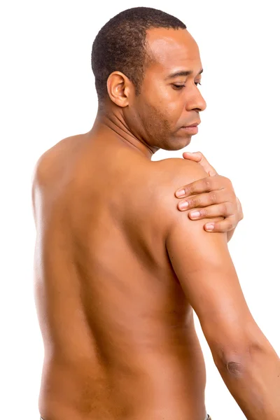 Africký muž s bolest ramene — Stock fotografie