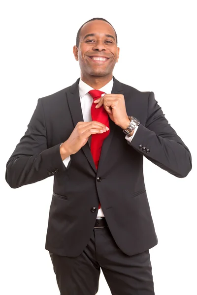 Business man fixing his tie — Stock Photo, Image