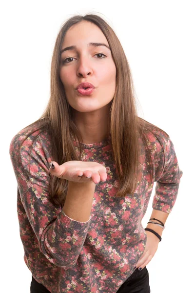 Ung kvinna blåser du en kyss — Stockfoto
