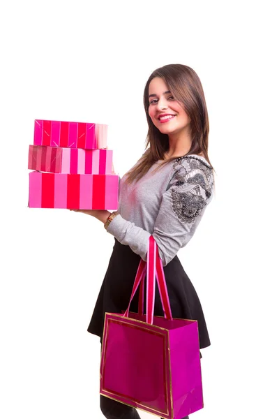 Kvinde holder nogle gaver - Stock-foto