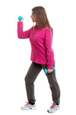 Egzersiz yapan güzel genç bir kadın