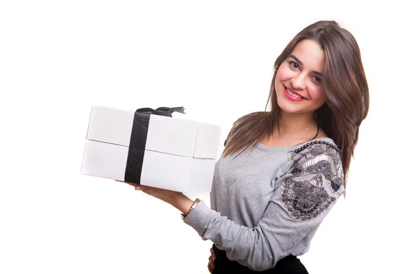 Young woman holding a present — Stock Photo, Image