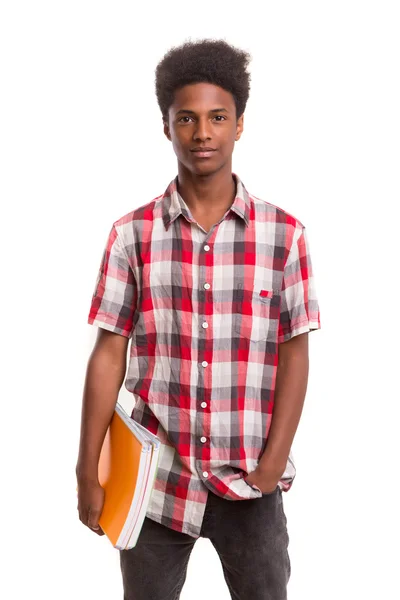 African student holds books in hand — Stock Photo, Image