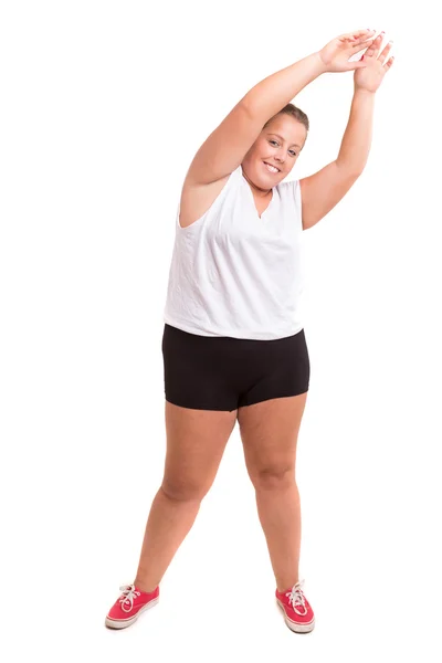 Mujer grande haciendo ejercicio — Foto de Stock