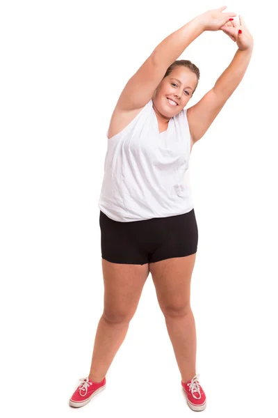 Большие упражнения женщины — стоковое фото