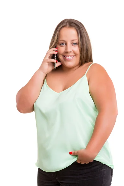 Grote vrouw aan de telefoon — Stockfoto