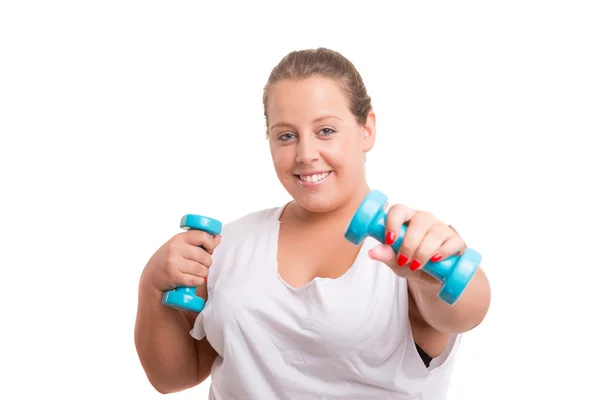 Large Woman exercising with dumbbells — Stock Photo, Image