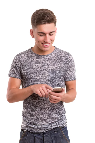 Pojke med hjälp av mobiltelefonen — Stockfoto