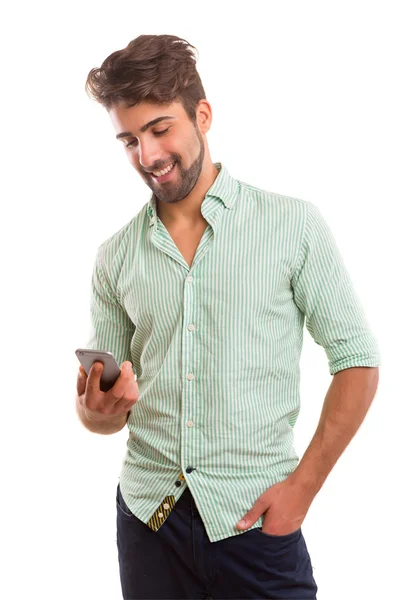 Young man using mobile phone — Stock Photo, Image