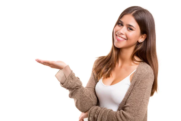 Young woman presenting your product — Stock Photo, Image