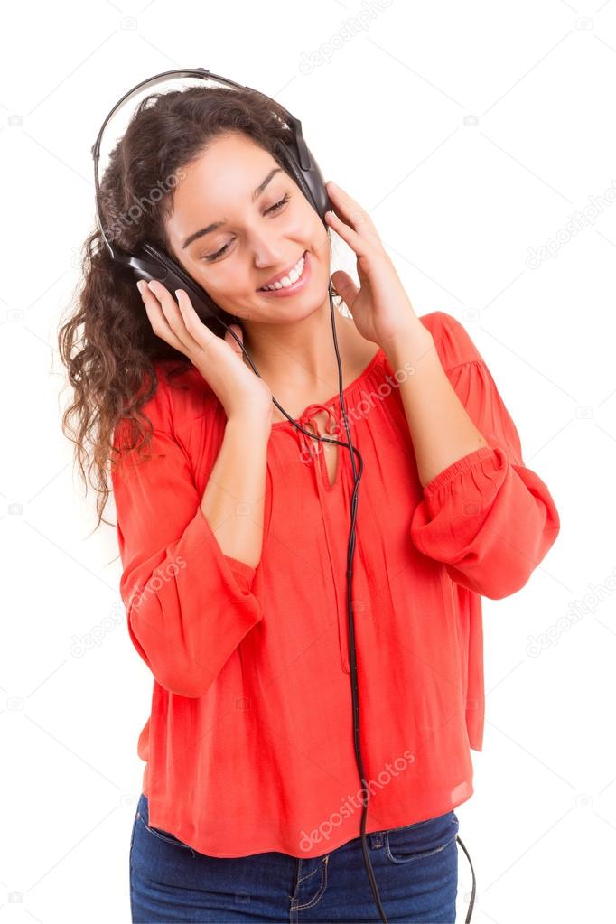 Woman listening to music in headphones