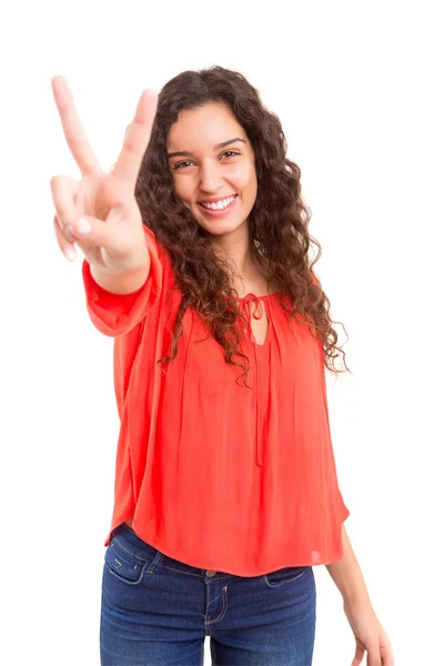 Vrouw gebaren overwinning teken — Stockfoto