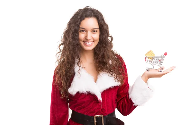Kvinna i jul kostym presentera produkten — Stockfoto