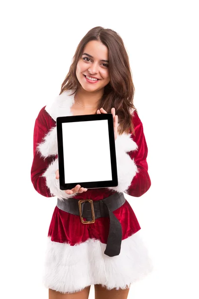 Mulher em traje de Natal apresentando produto — Fotografia de Stock