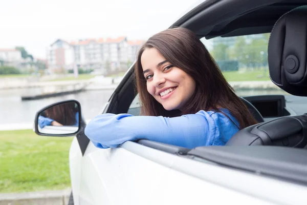 Woman driving her new sports car — Stock Photo, Image