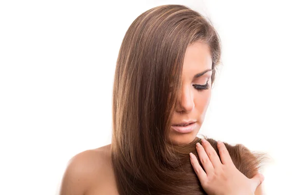 Mooie vrouw met gezonde lange haren — Stockfoto