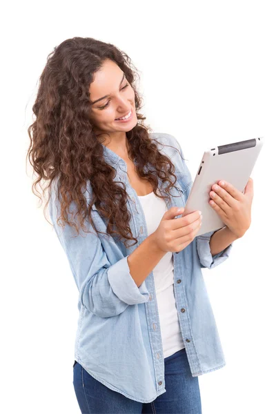 Mujer relajante con una tableta —  Fotos de Stock