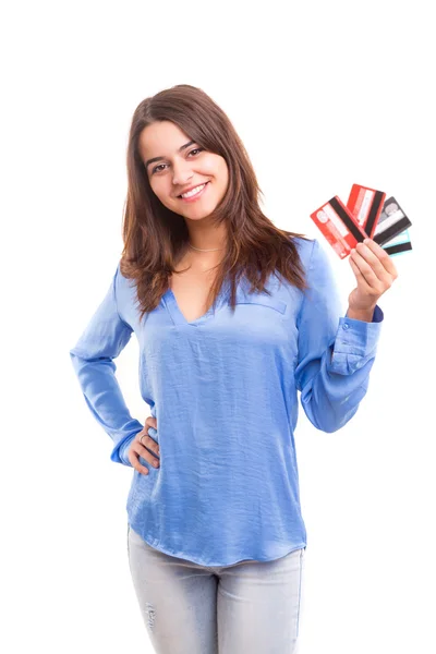 Mujer feliz sosteniendo tarjetas de crédito — Foto de Stock