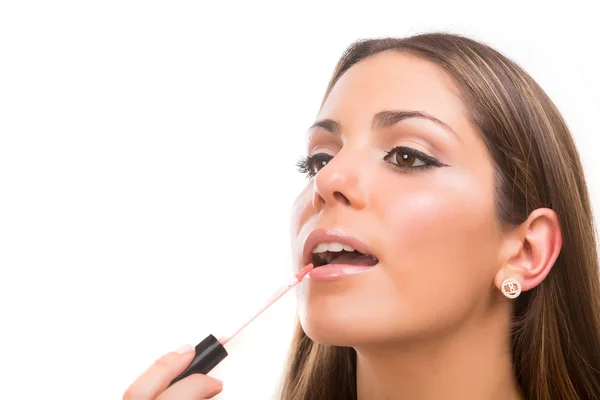 Beautiful woman applying makeup — Stock Photo, Image