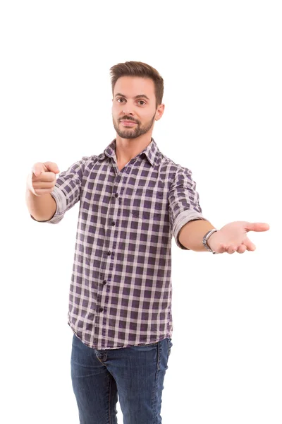 Young man presenting your product — Stock Photo, Image