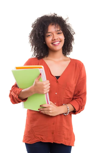 Hermoso estudiante sosteniendo cuadernos —  Fotos de Stock