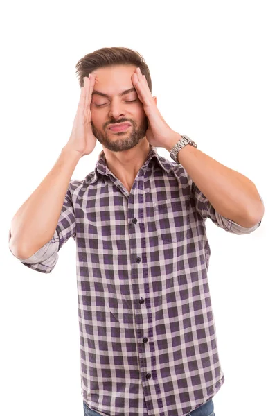 Jonge man met een hoofdpijn — Stockfoto