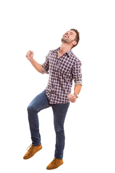 Young man celebrating with fists up — Stock Photo, Image