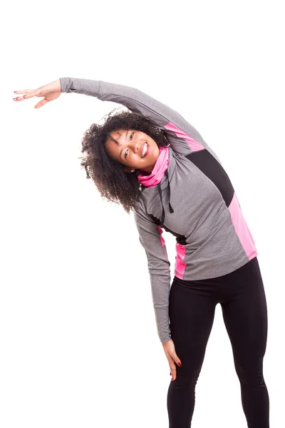 Hermosa mujer africana haciendo ejercicio — Foto de Stock