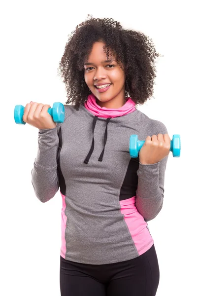 African woman exercising with dumbbells — Stock Photo, Image