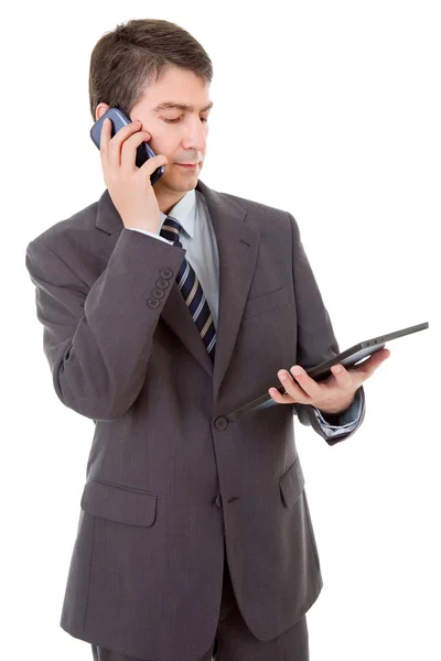 Businessman using touch pad of tablet pc, on the phone, isolated — Stock Photo, Image